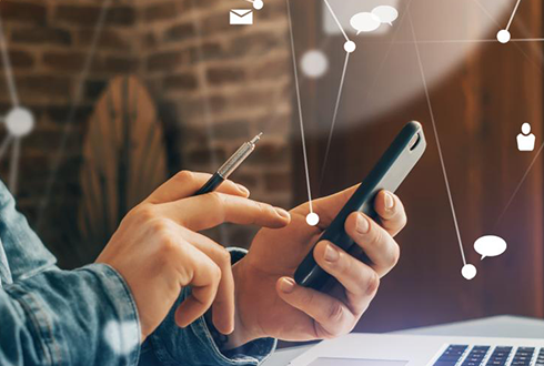 close up of man holding smartphone